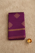 Maroon  soft silk saree decorated with traditional South Indian kolam motifs